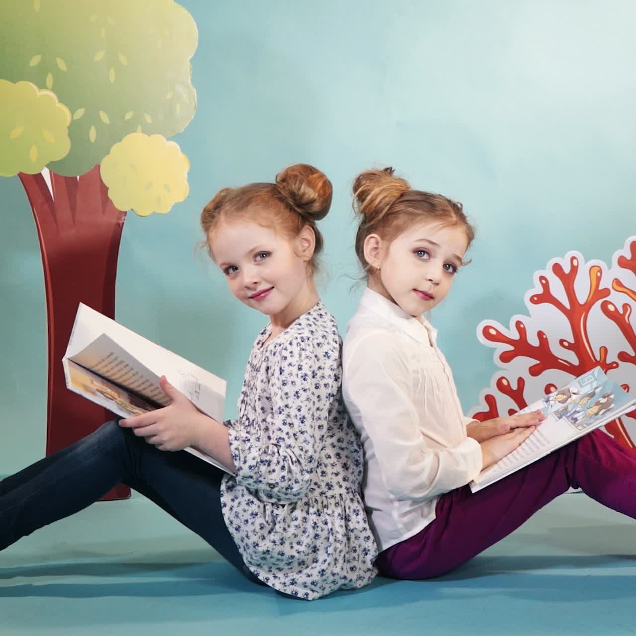 Children with books in studio