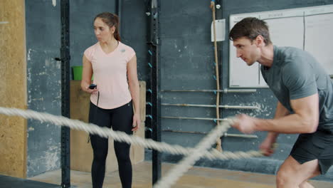 fitness training with rope in a gym