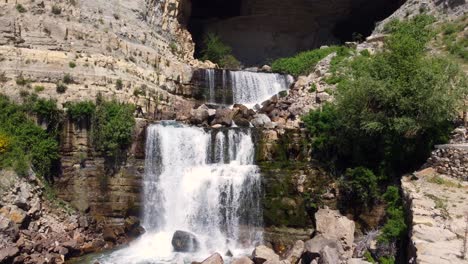 Scenic-View-Of-The-Afqa-Waterfalls-In-The-Rocky-Mountains-Of-Lebanon---moving-medium-shot