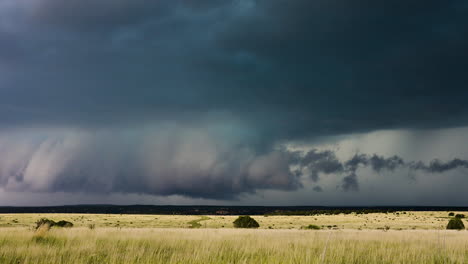 slow panning view across beautiful fields as big storm rolls by