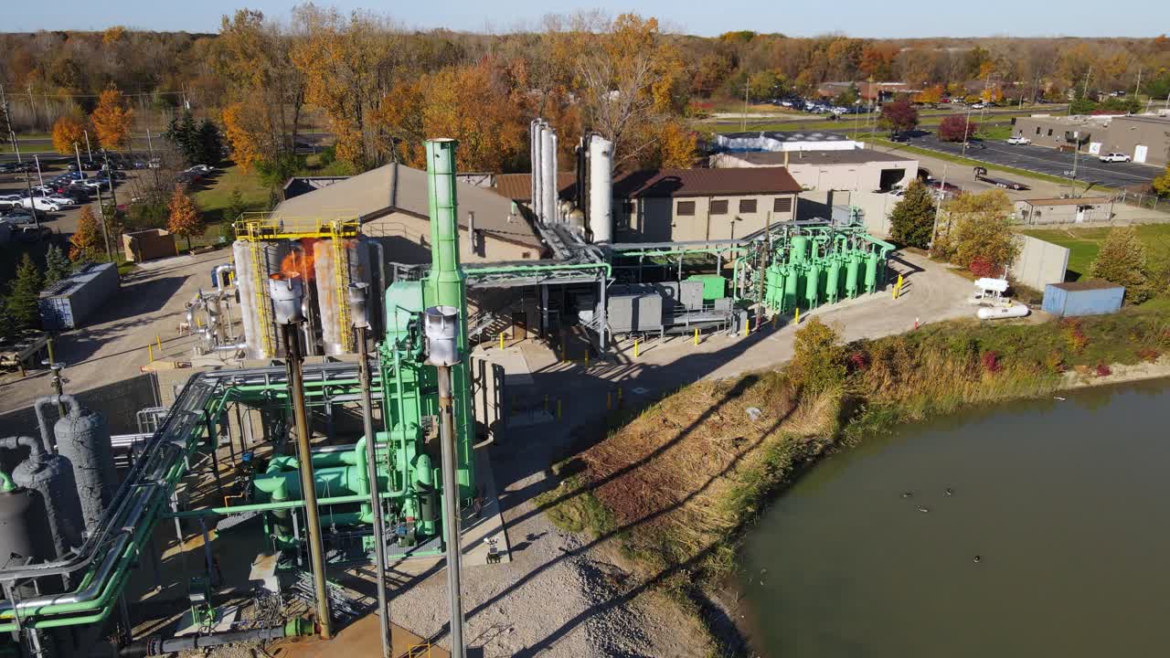 Flare stacks with burning methane from a landfill, that can be used to generate electricity, Canton, Michigan, USA