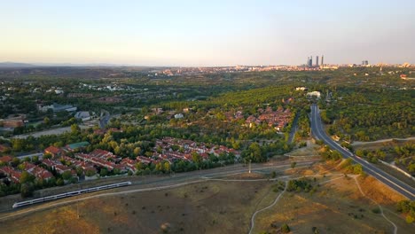 Scenic-cinematic-aerial-view-of-Renfe-train-crossing