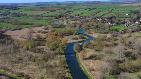 Aerial-flying-towards-Longstock-Sunny-Day-UK-4K