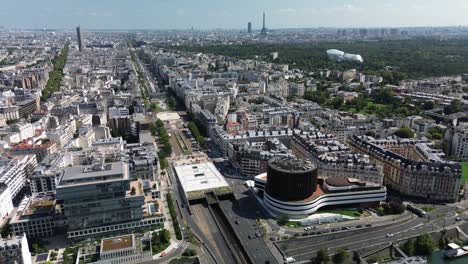 sacem building with louis vuitton foundation and tour eiffel in background, paris cityscape, france