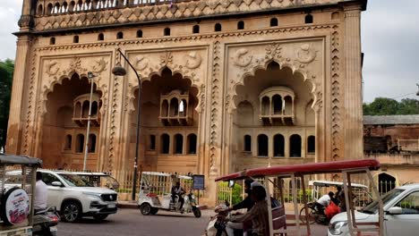 a cinematic view of bada imam bara's majestic entrance on city road the main entrance gate of bada imambara complex on the city road with islamic architecture built by nawab