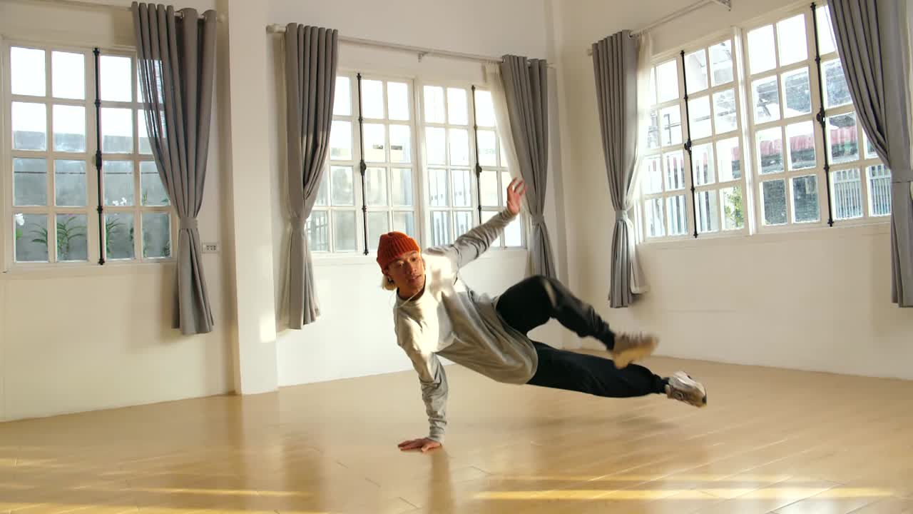 Young Asian Male Breakdancer Dancing. Slow Motion, Slow Motion
