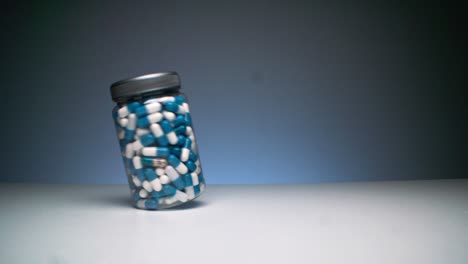 spinning bottle with capsule pills