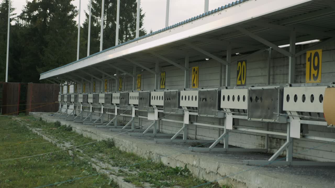 Panorama of targets for shooting at biathlon stadium. Numbering of shooting sports targets. Empty shooting range. Winter sports concept