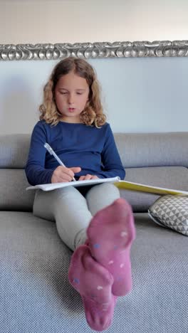 girl writing in a notebook
