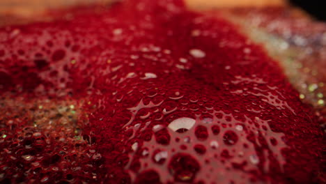 red glitter liquid bubbles