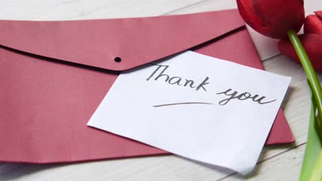 thank you note with red tulips