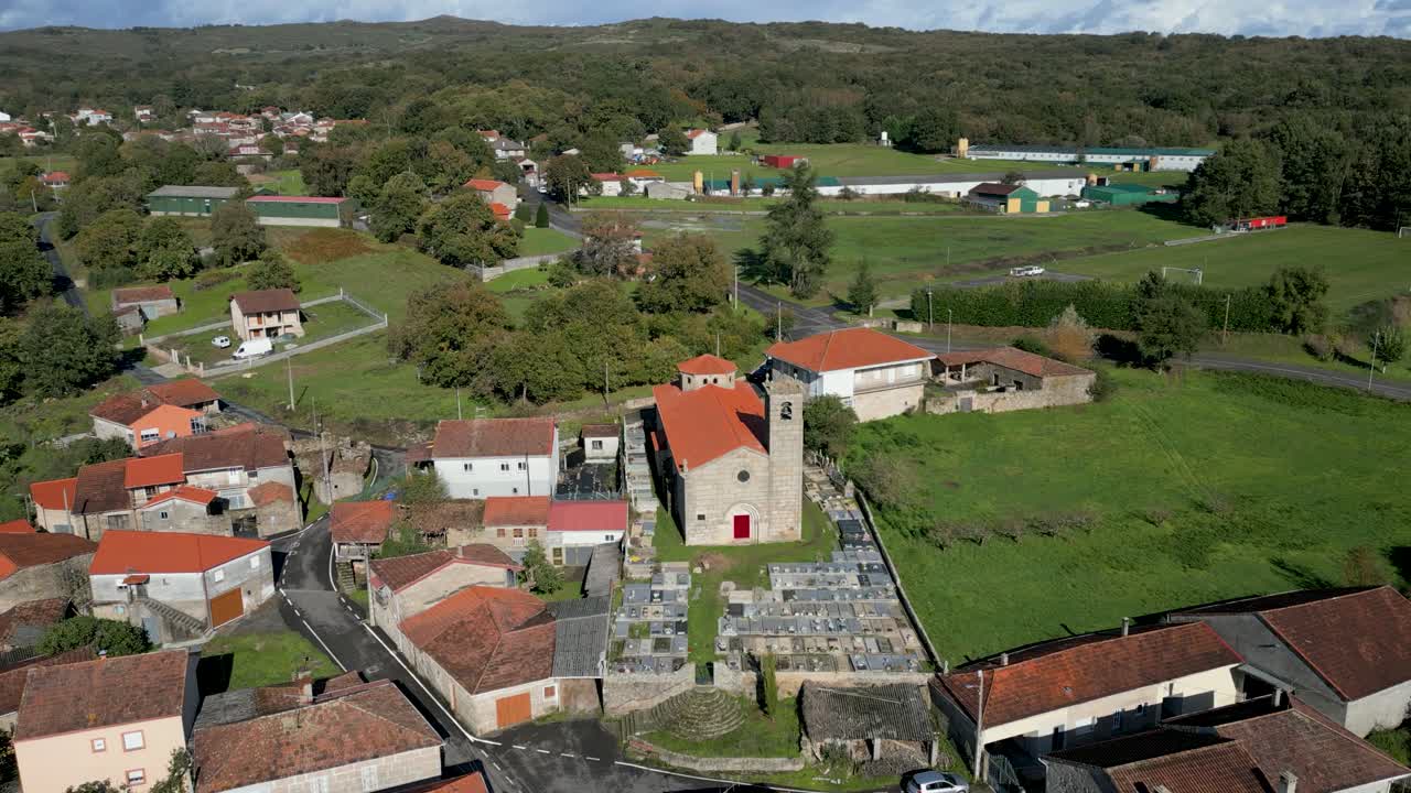 Drone shot of Santa María de Parada de Outeiro church and surroundings in Vilar de Santos, Spain