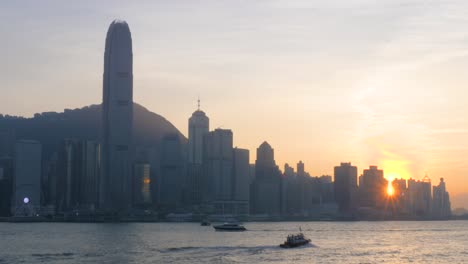 as sun drops victoria harbour, city transforms into realm of ethereal beauty