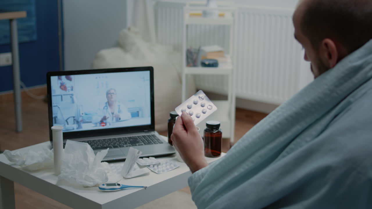 Ill patient talking on video call conference for telehealth