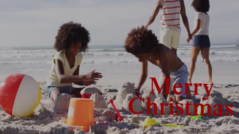 Animation-of-merry-christmas-over-happy-african-american-siblings-playing-with-sand-on-beach