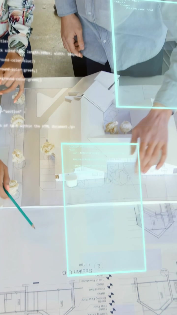 Vertical video: Architects pointing at printed plan activating AR UI and adjusting model for review