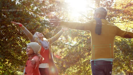 animation of white lines over happy family in autumn park