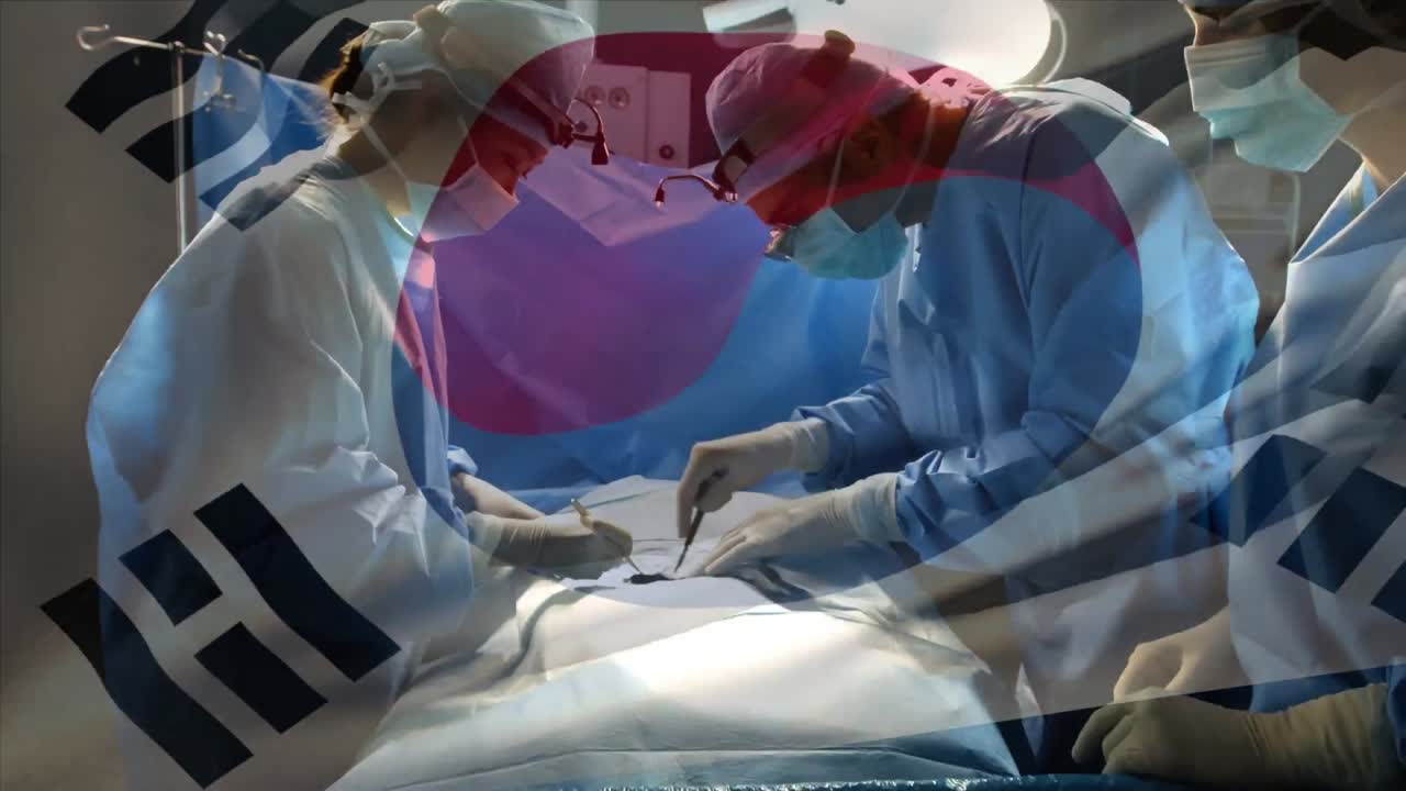 수술실에서 외과 의사 들 위 에 한국 국기 가 흔들리는 애니메이션