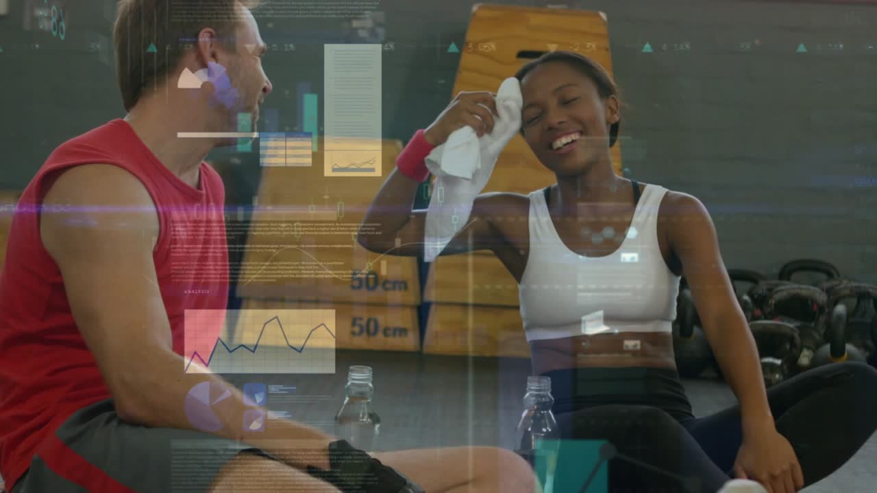 Fitness partners sitting post-workout wiping and chatting for rest while HUD floating over subjects