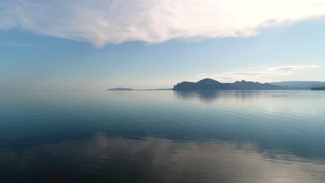 serene coastal landscape with reflecting water