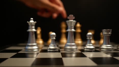 Cinematic-shot-of-human-hands-playing-chess,-moving-figures-across-chessboard,-chess-game-concept