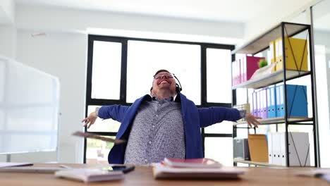 excited businessman celebrating success with falling money