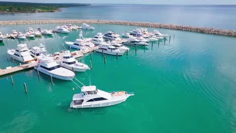 drone flight shows leisure yachts moored at marina casa de campo, la romano