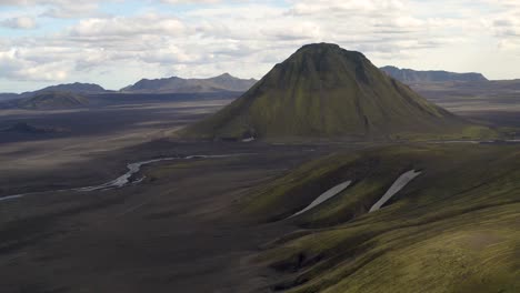 maelifell mountain covered with moss in southern iceland - aerial pullback