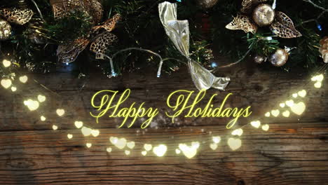 happy holidays with a glowing string of fairy lights