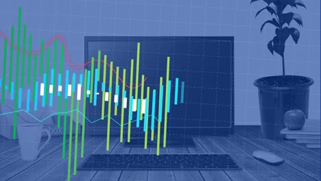 Colourful-graphs-processing-data-over-computer-screen-and-plant-on-desk