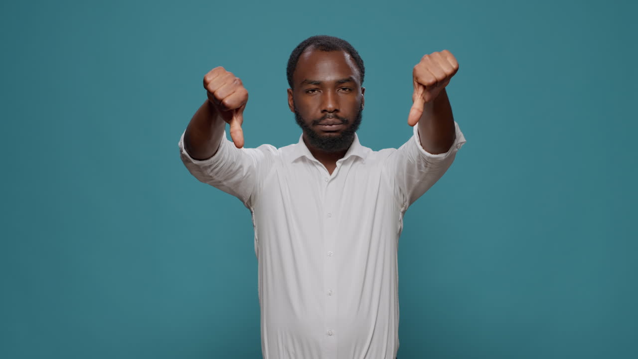 Man Giving Thumbs Down