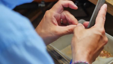 Craftswoman-working-in-workshop