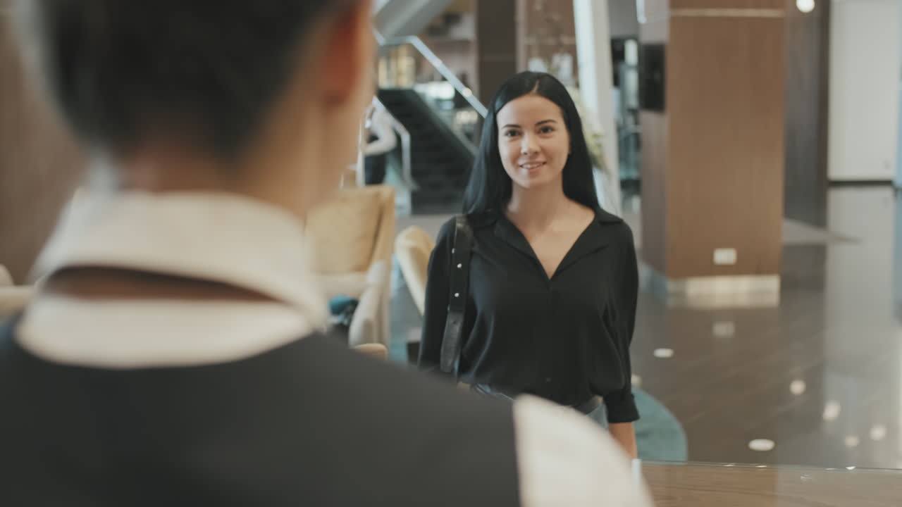 Pretty Woman Checking-In at Hotel