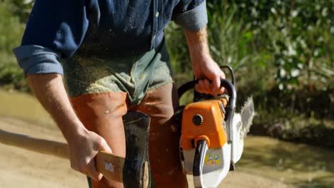 lumberjack using tool for cutting tree log 4k