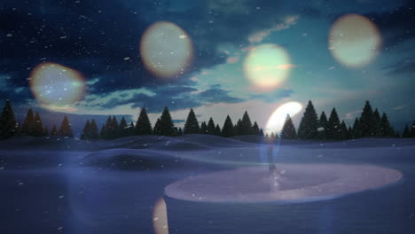 snowflakes animation falling over candlelight in snowy forest landscape during winter