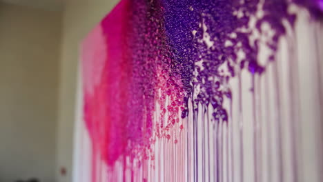 abstract fluid painting in pink and purple