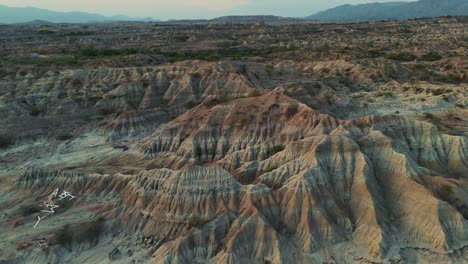 incredible red organge erosion in tatacoa desert landscape, aerial