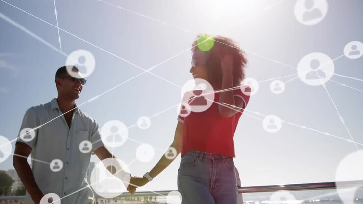 Animation of network of connections over happy couple on the beach