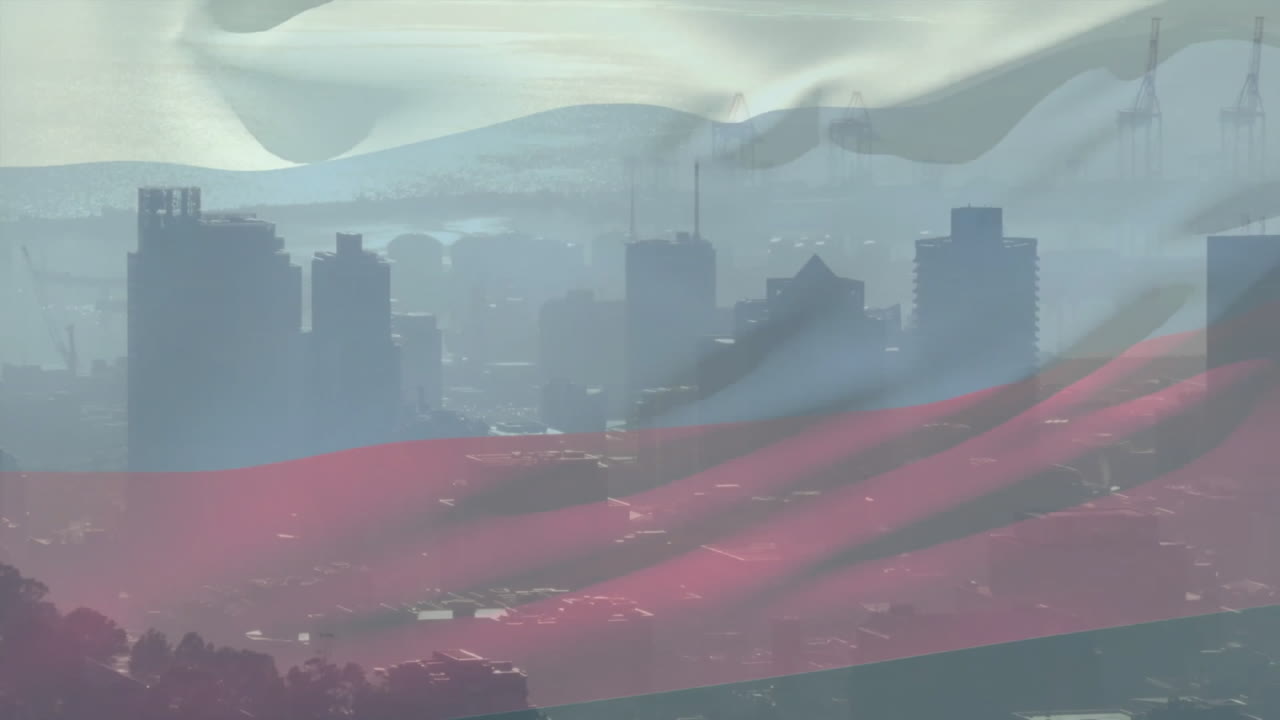 City skyline with cranes and buildings, animation of translucent flag overlaying