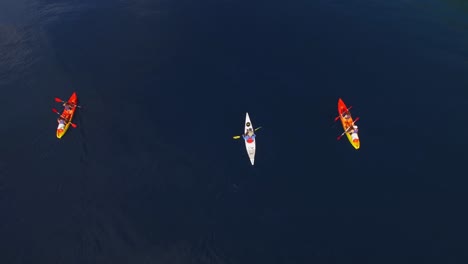 the group has fun in a canoe on the beautiful sea