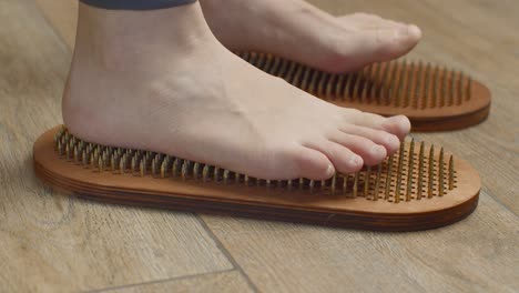 feet on reflexology mats