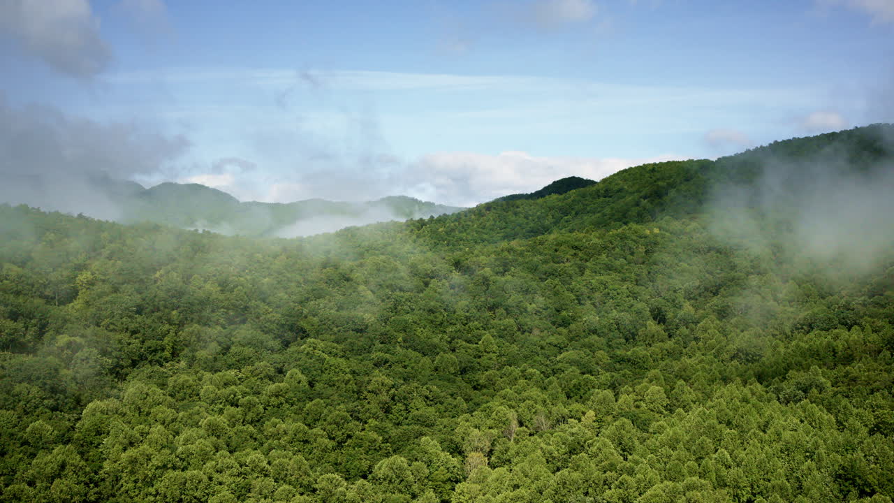 North Carolina Smoky Mountains shrouded in fog, seen from a drone
