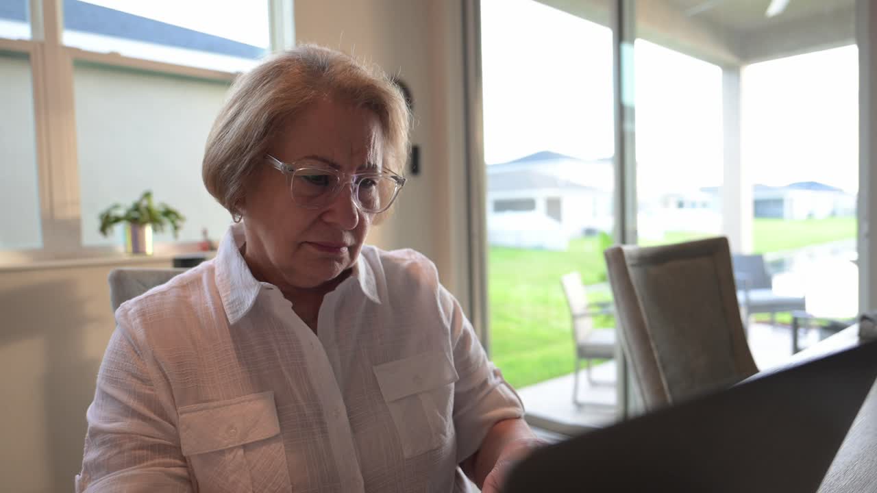 senior citizen asks herself why something could turn out that way after receiving an email from a friend