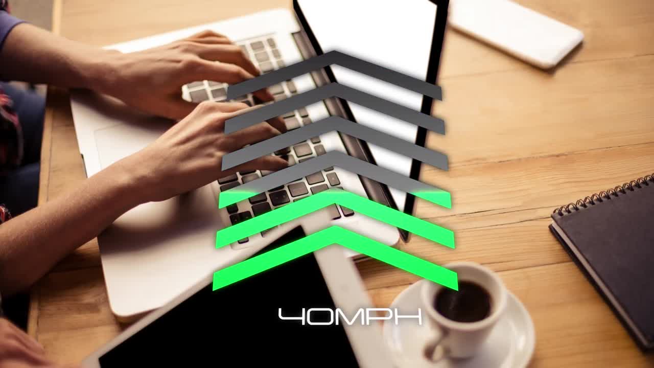 Animation of internet speed icon over person using laptop