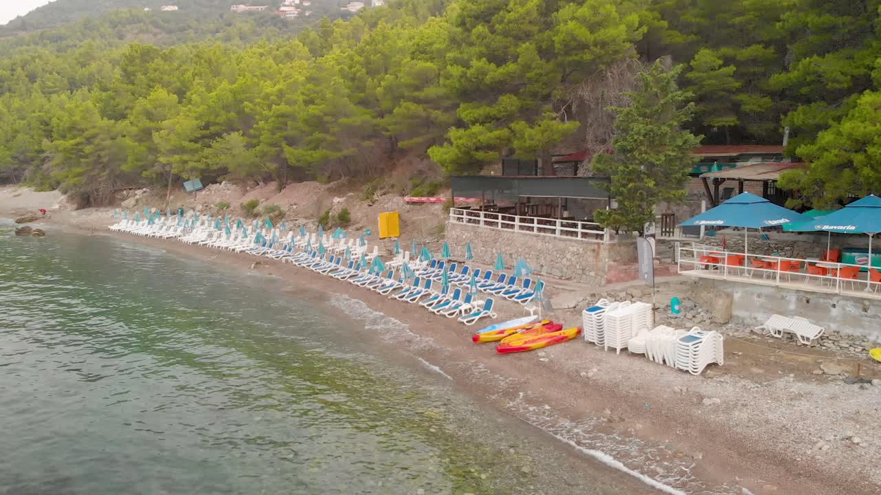 Aerial Drone Cinematic slow motion footage of beach on adriatic sea in montenegro