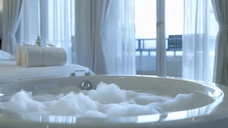 luxury hotel room with a relaxing spa tub