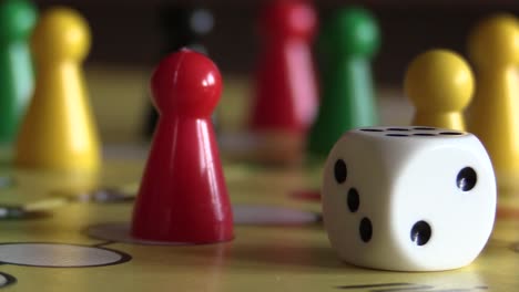 traditional board game with a dice, amusement or gambling concept with no people, close up