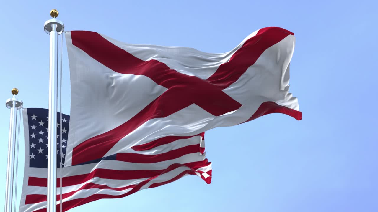 앨라배마 주와 미국 발이 바람에 흔들리고 있습니다.