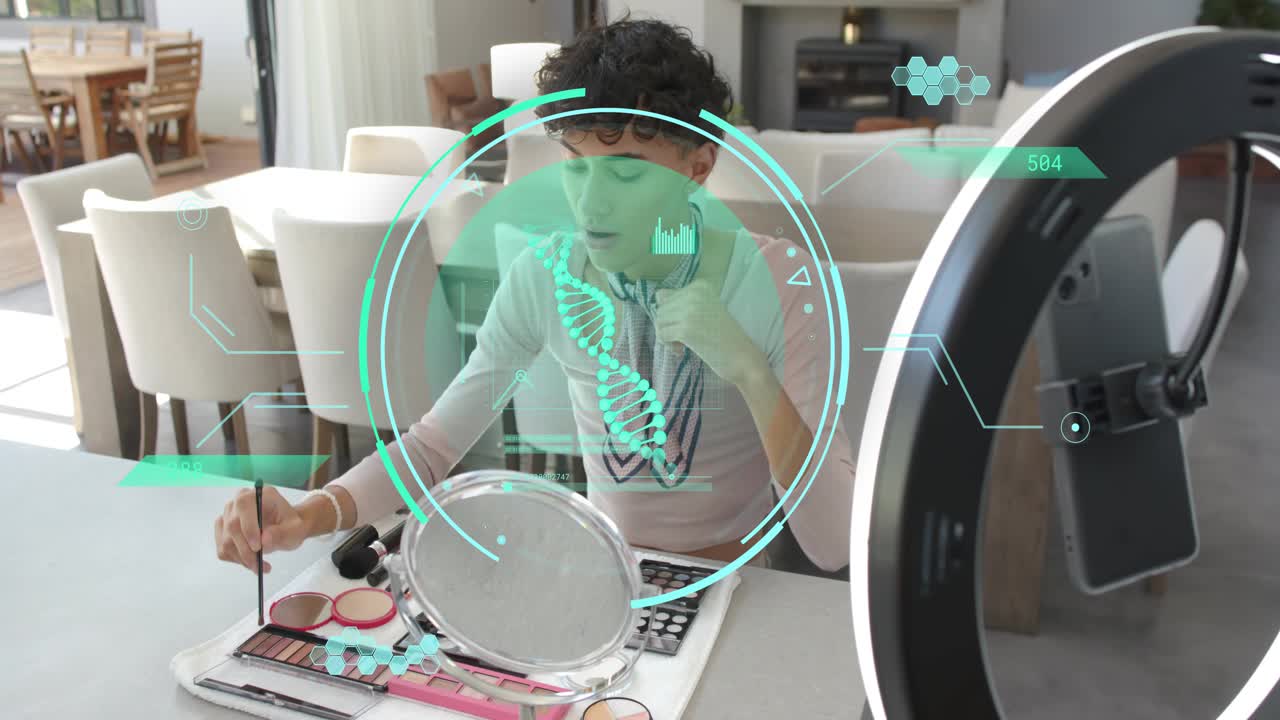 Adult male reaching for brush, applying shadow in beauty setup, cyan HUD overlaying frame to record