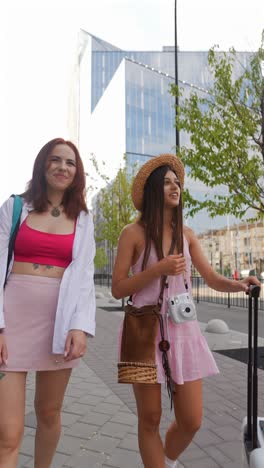 two friends walking in a city